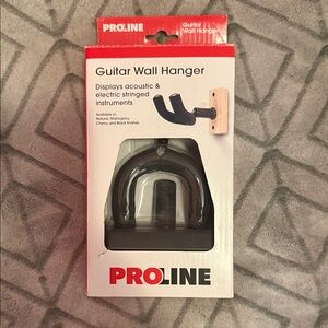 BRAND NEW. Proline Black Guitar Wall Hanger